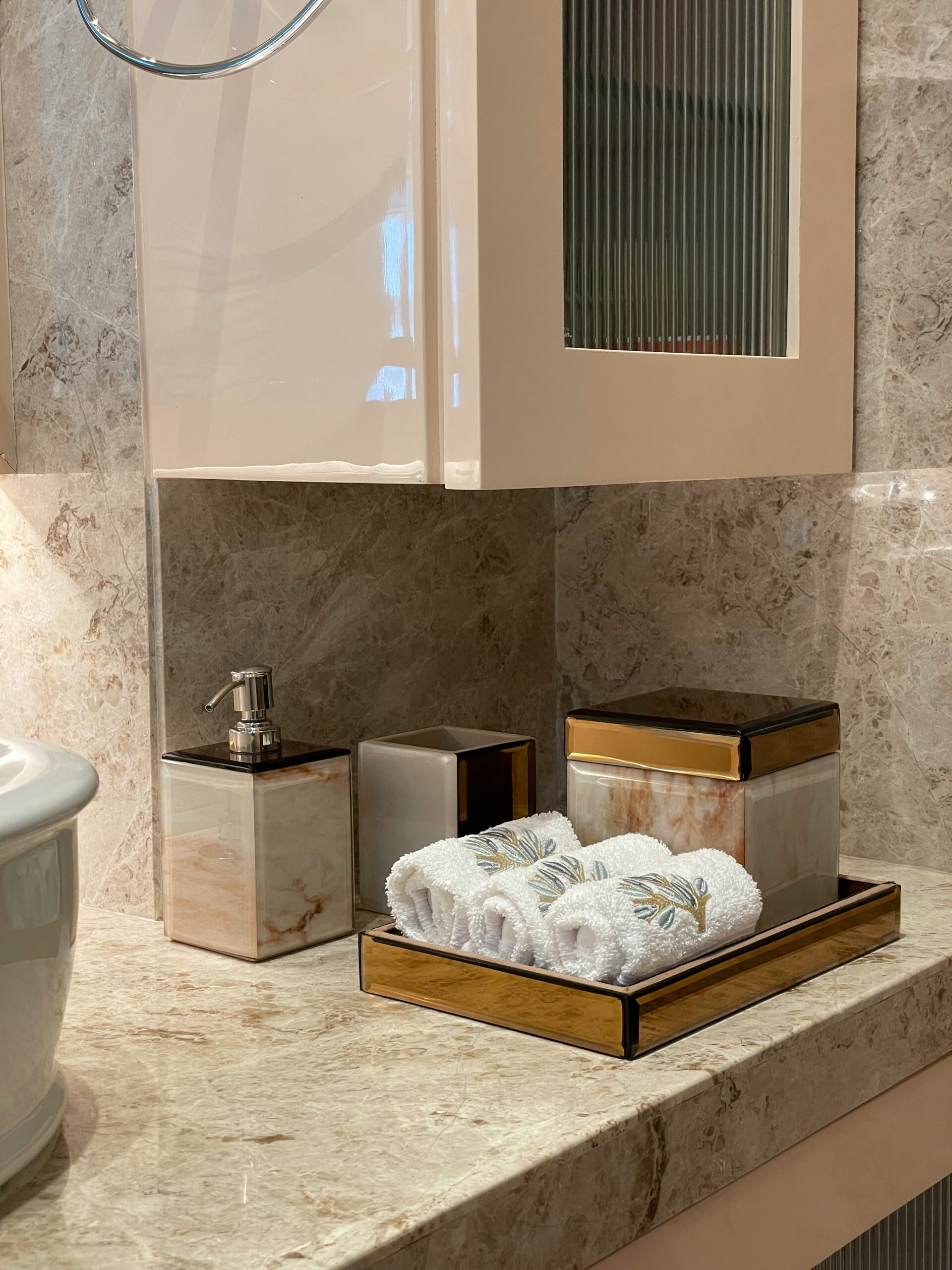 white ceramic sink near white ceramic toilet bowl